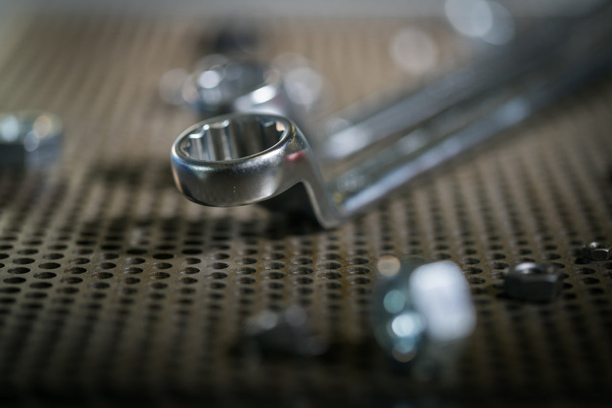 Llave estrella doble acodada