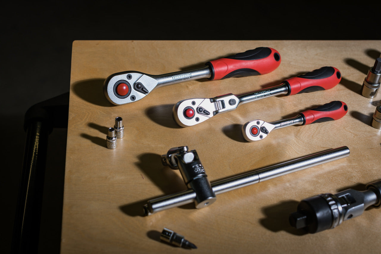 R40000027 - Carraca reversible de 1/4" amb mànec de 2 components